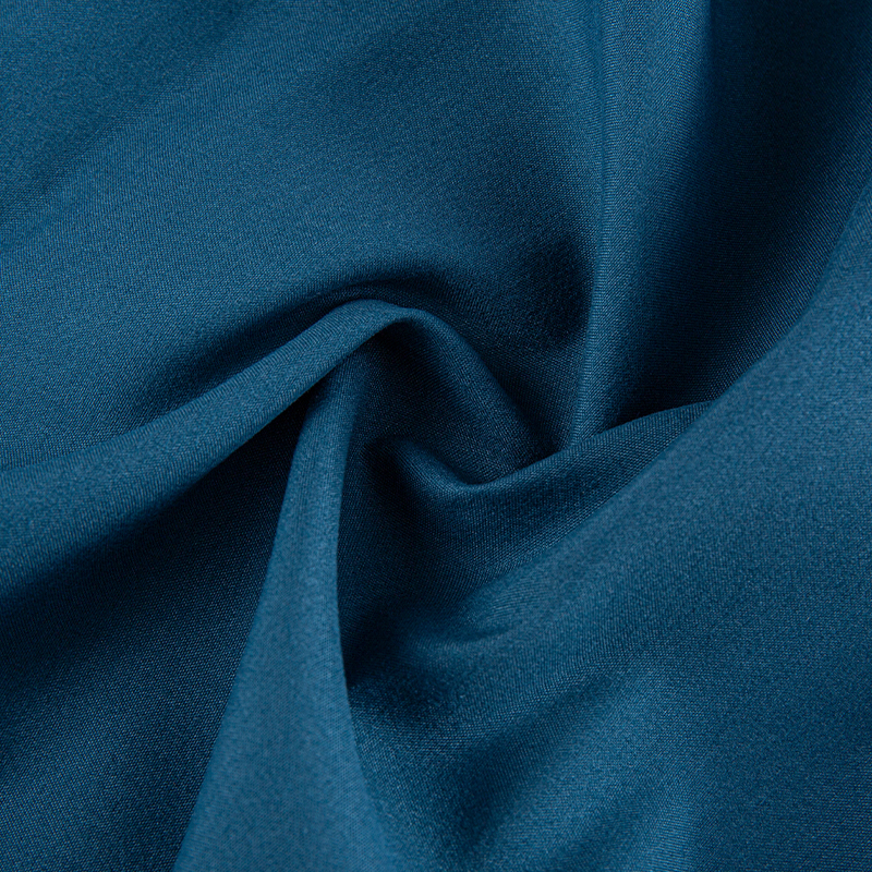 Dyb blågrøn elasticitet polyester mikrofiber farvet stof